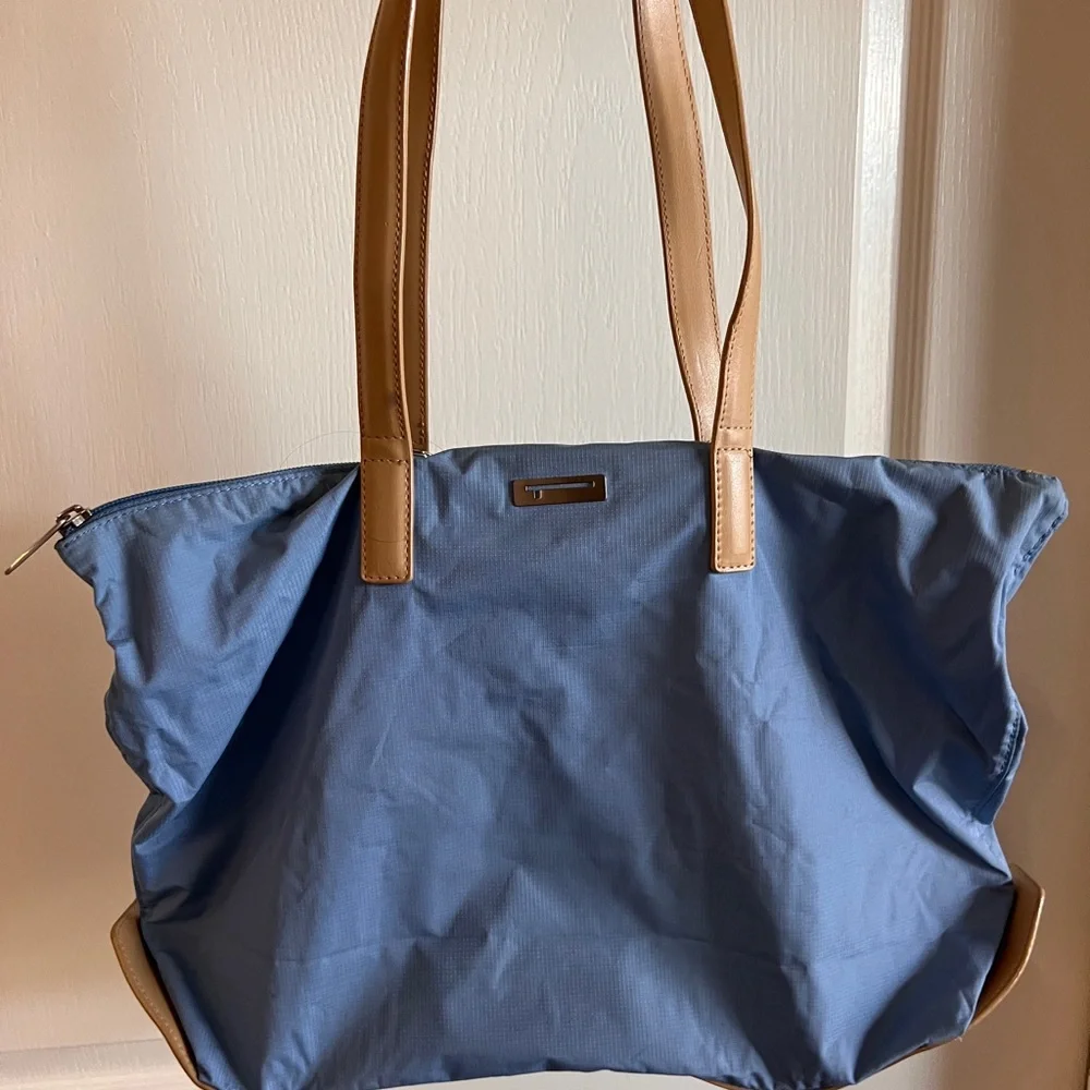 Tumi light blue